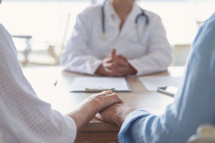 A clinician explaining imaging results