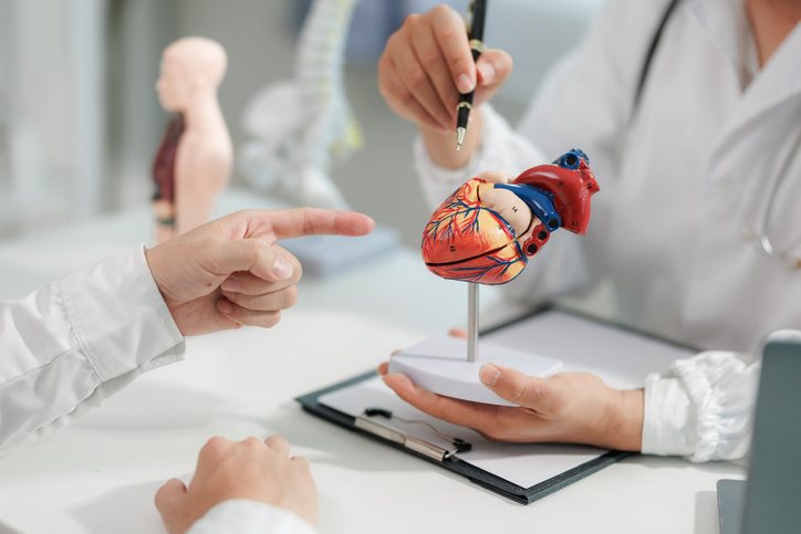 A clinician explaining imaging results